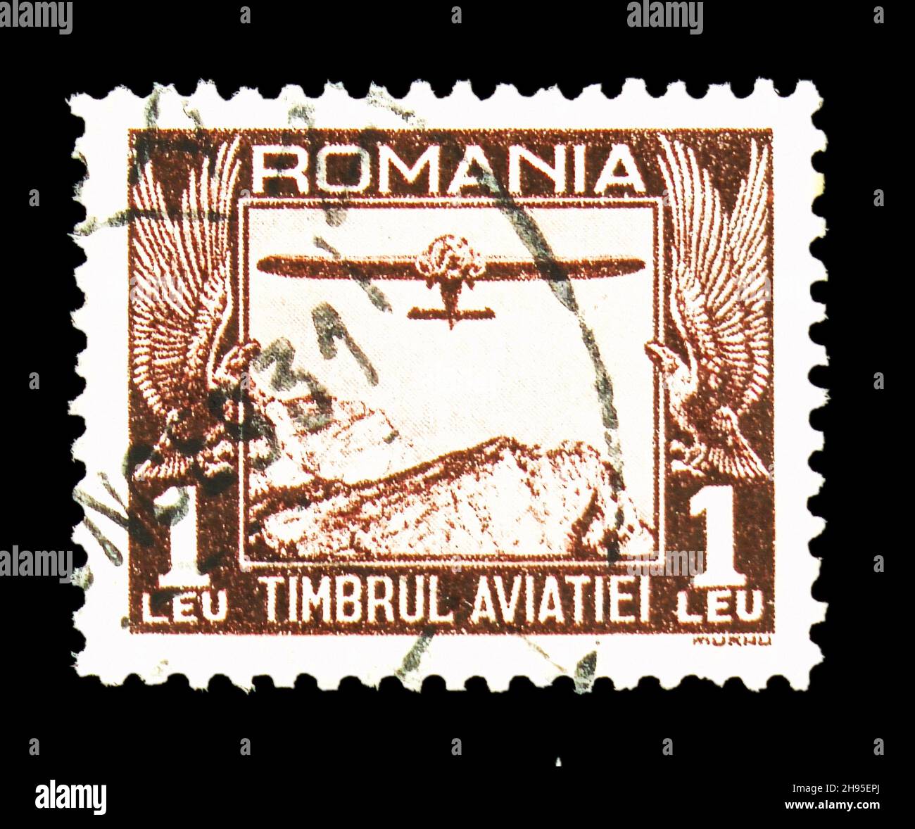 MOSCOW, RUSSIA - OCTOBER 24, 2021: Postage stamp printed in Romania shows Aircraft over Mountainous Landscape, National Fund for Aviation serie, circa Stock Photo