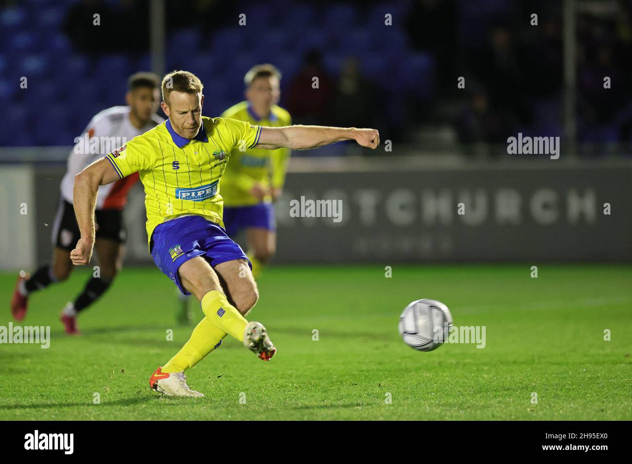 SOLIHULL, ENGLAND. DECEMBER 4TH 2021. Adam Rooney of Solihull Moors scores his sides second goal from the penalty spot during the Vanarama National League match between Solihull Moors and Woking FC at the Armco Stadium, Solihull on Saturday 4th December 2021. (Credit: James Holyoak/Alamy Live News) Stock Photo