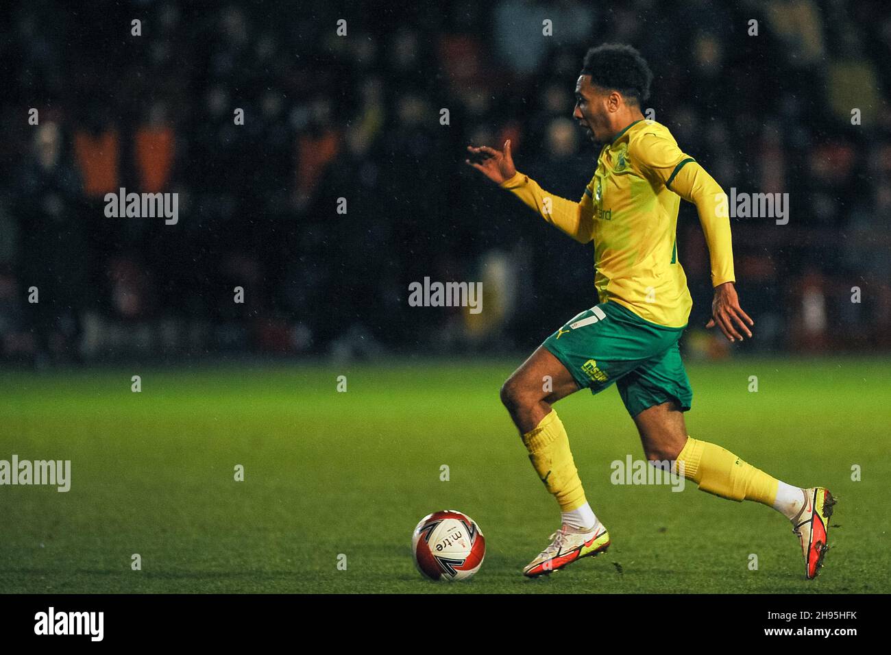J.Mitchell-Lawson (Swindon no. 17 ) on the attack during the FA Cup second round match between Walsall and Swindon Town at the Banks's Stadium, Walsall, England on 4 December 2021. Photo by Karl Newton/PRiME Media Images. Credit: PRiME Media Images/Alamy Live News Stock Photo