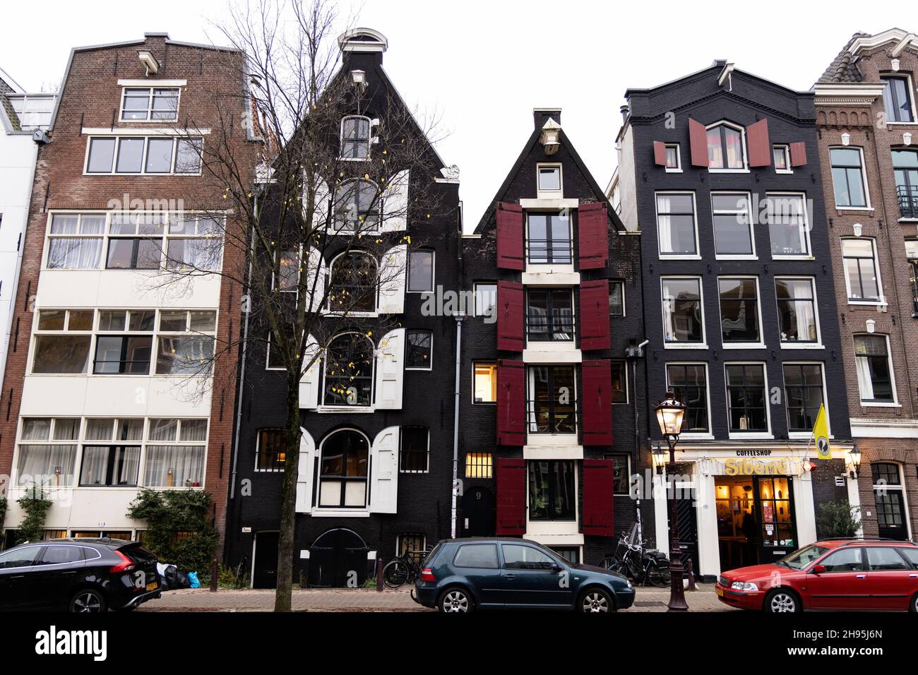 Traditional buildings on Brouwersgracht in Amsterdam, Netherlands. The colored shutters on former breweries depict which variety of beer they brewed. Stock Photo