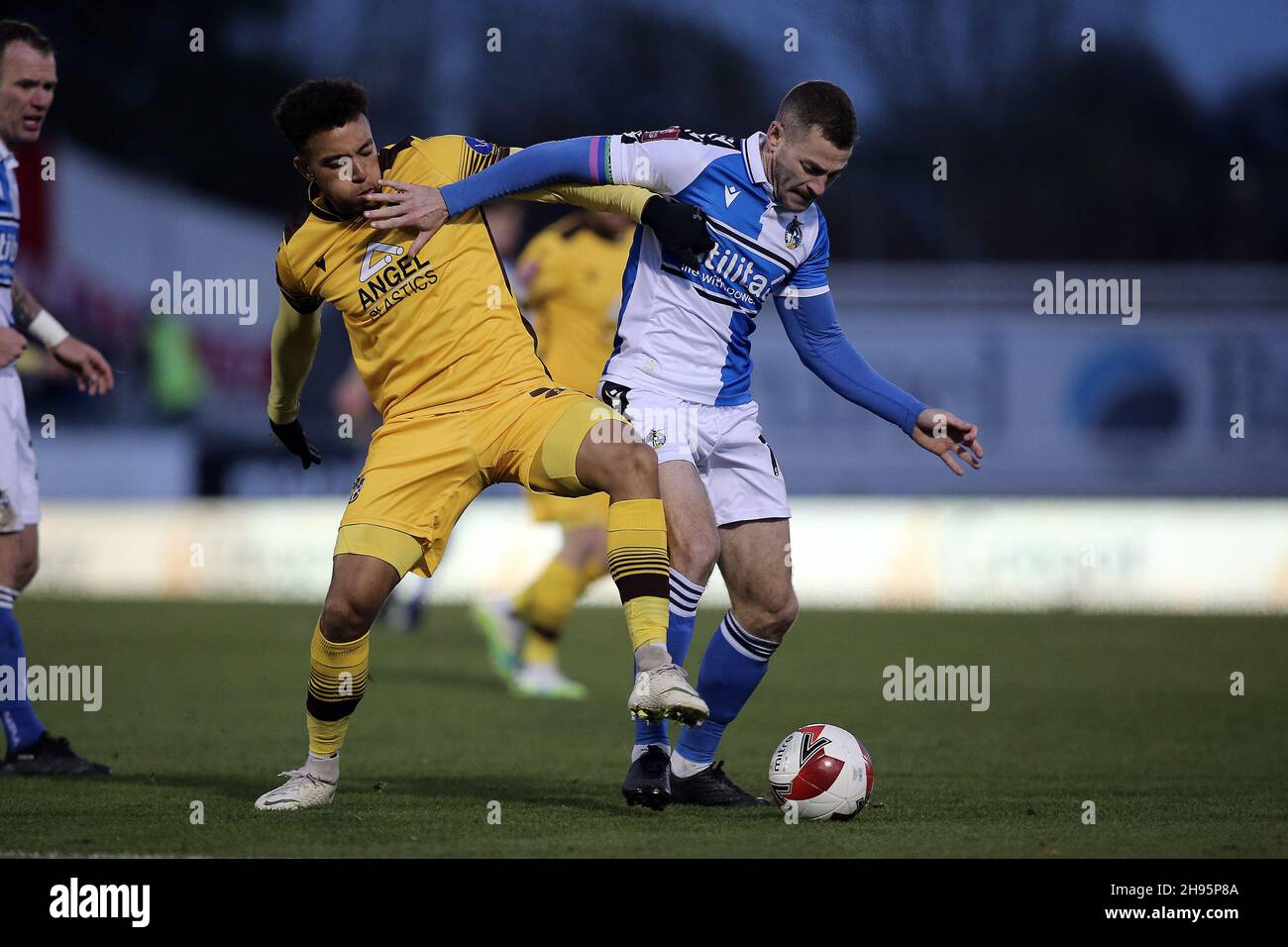Bristol, UK. 04th Dec, 2021. Donovan Wilson of Sutton United and Paul Coutts of Bristol Rovers during the FA Cup 2nd round match between Bristol Rovers and Sutton United at the Memorial Stadium, Bristol, England on 4 December 2021. Photo by Dave Peters/PRiME Media Images. Credit: PRiME Media Images/Alamy Live News Stock Photo