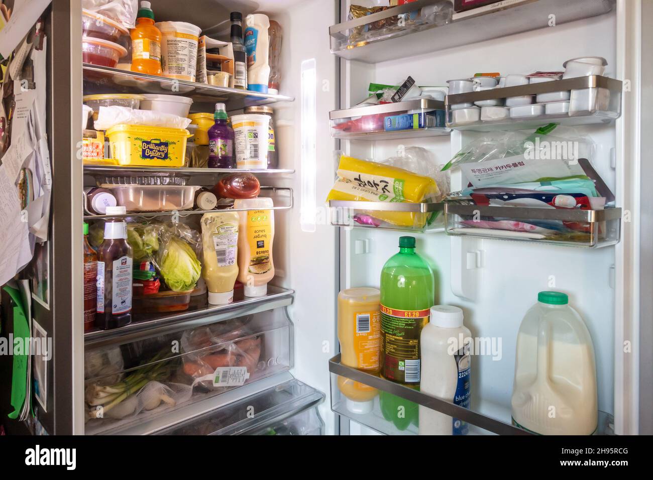 Fresh food inside a fridge Stock Photo - Alamy