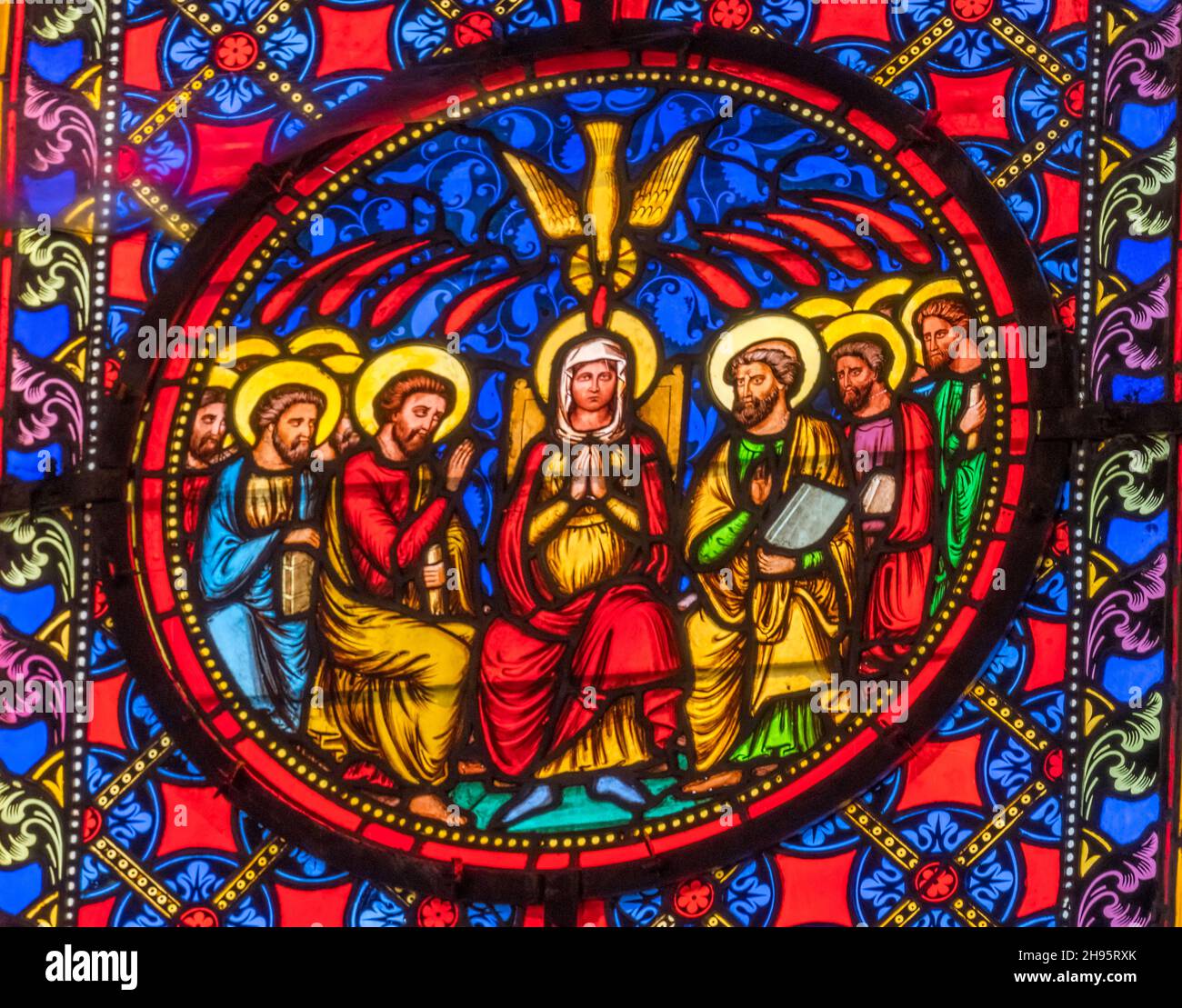 Colorful Virgin Mary Disciples Holy Spirit Stained Glass Basilica Bayeux Cathedral Our Lady of Bayeux Church Bayeux Normandy France. Church consecrate Stock Photo