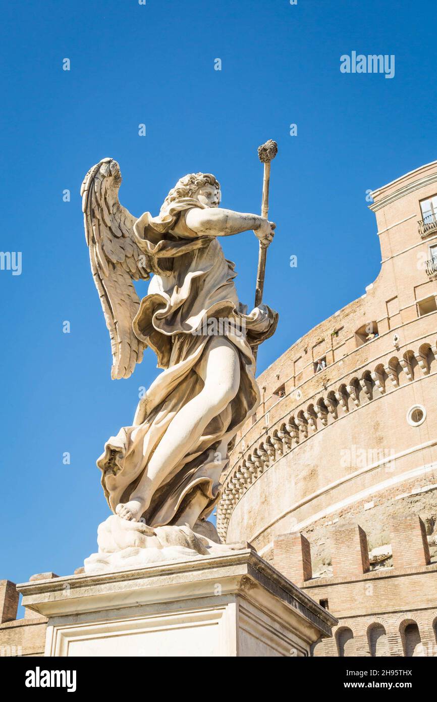 Statue of an Angel at Castel di Angelo in the Vatican with blue sky background Stock Photo