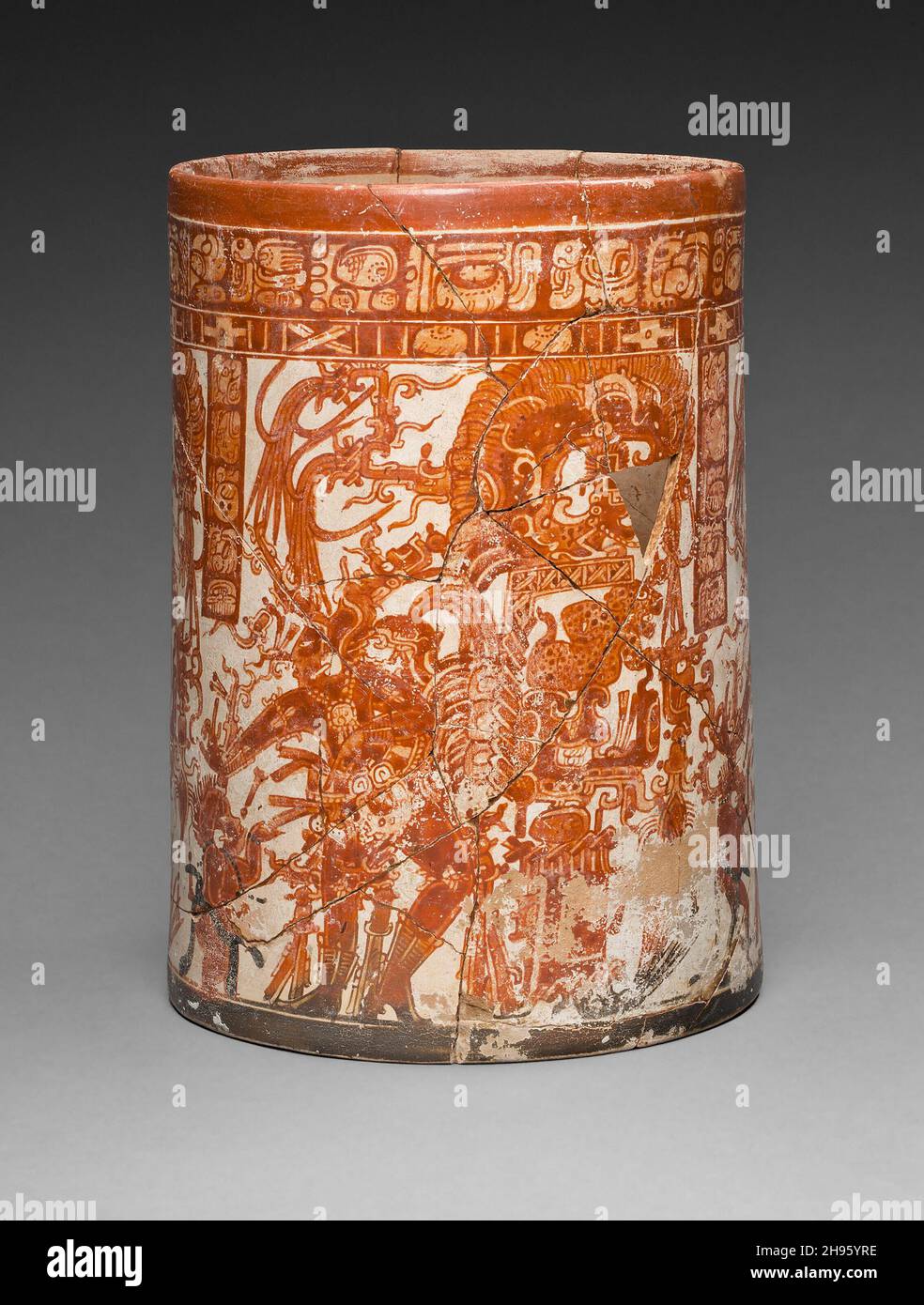 Vessel of the Dancing Lords, A.D. 750/800. Cup-shaped ceramic vessel, Maya ruler dressed as the maize god with red glyphs and dancing figures, orange on cream ground. Possibly painted as a funerary offering. Maya, Naranjo, Pet&#xe9;n, Guatemala. Stock Photo