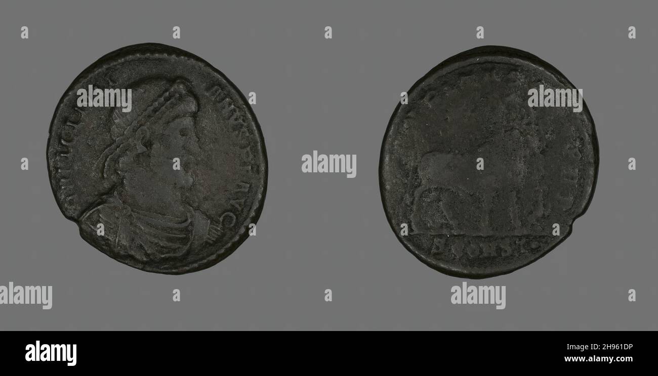 Base (Coin) Portraying Emperor Julianus, 360-363. Bull on reverse. Minted in Arelate (modern Arles). Stock Photo