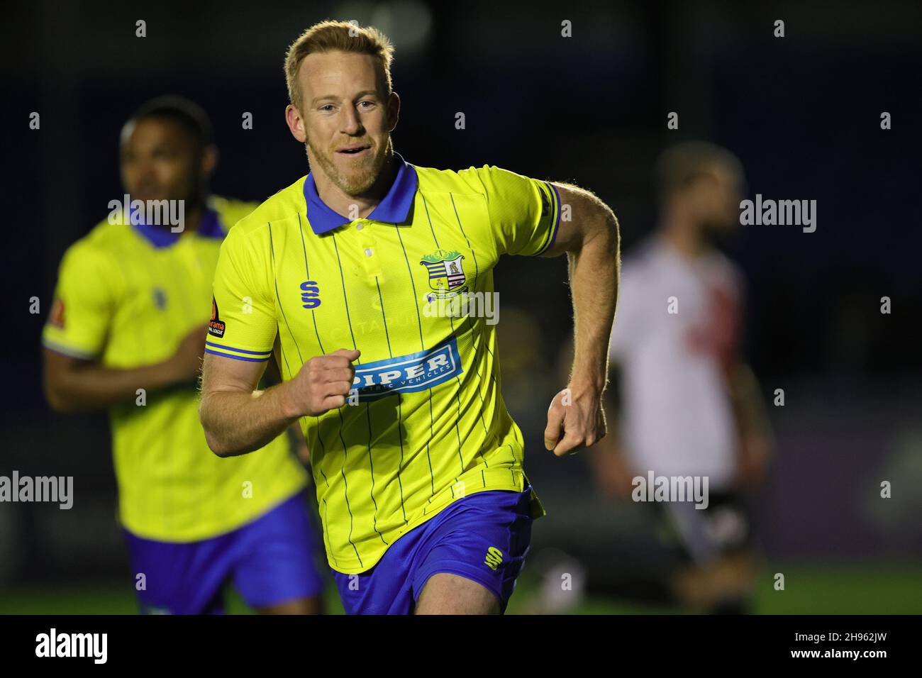 SOLIHULL, ENGLAND. DECEMBER 4TH 2021. Adam Rooney of Solihull Moors celebrates after scoring their teams second goal from the penalty spot during the Vanarama National League match between Solihull Moors and Woking FC at the Armco Stadium, Solihull on Saturday 4th December 2021. (Credit: James Holyoak/Alamy Live News) Stock Photo