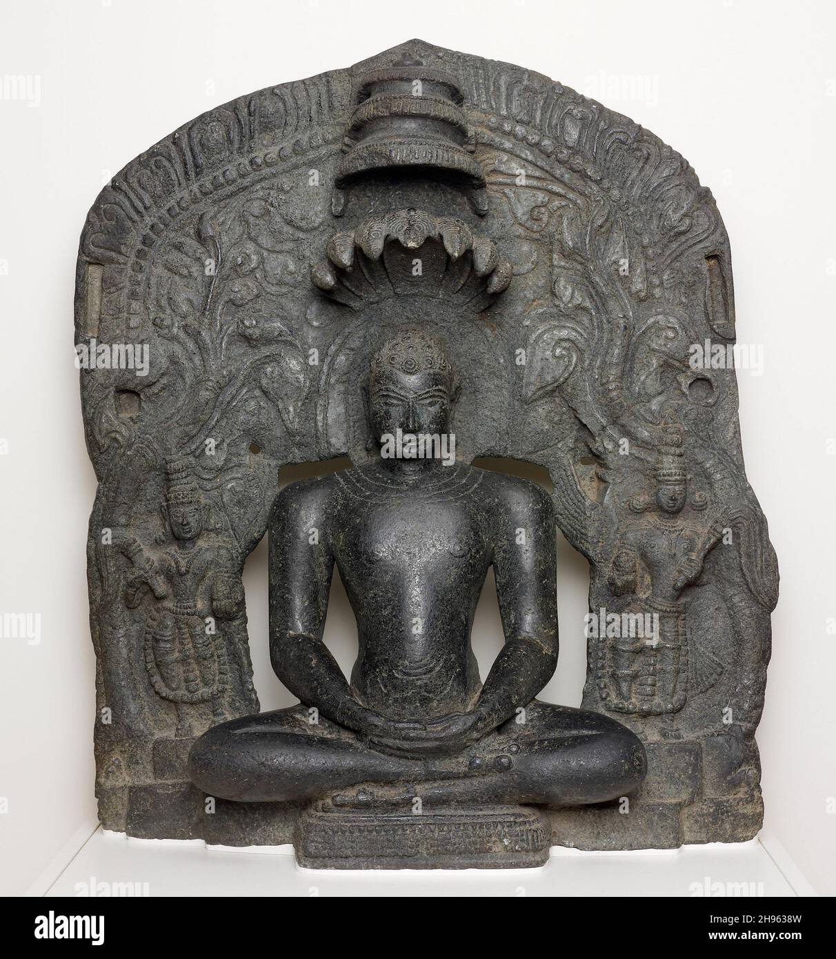 Jaina Tirthankara Parshvanatha with Serpent Hood Seated in Meditation ...