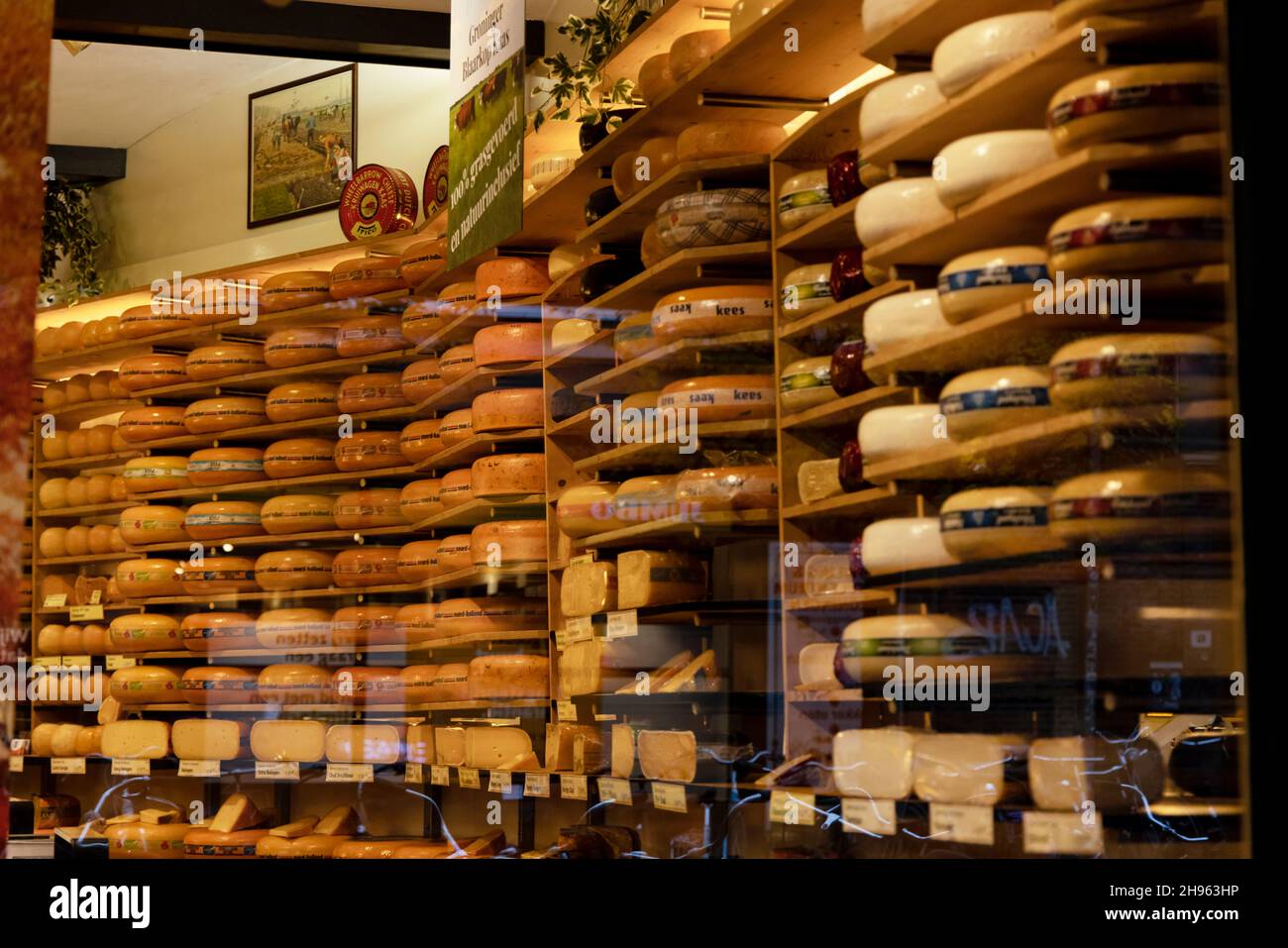 Looking through the window of a Dutch cheese shop in Groningen, Netherlands. Stock Photo
