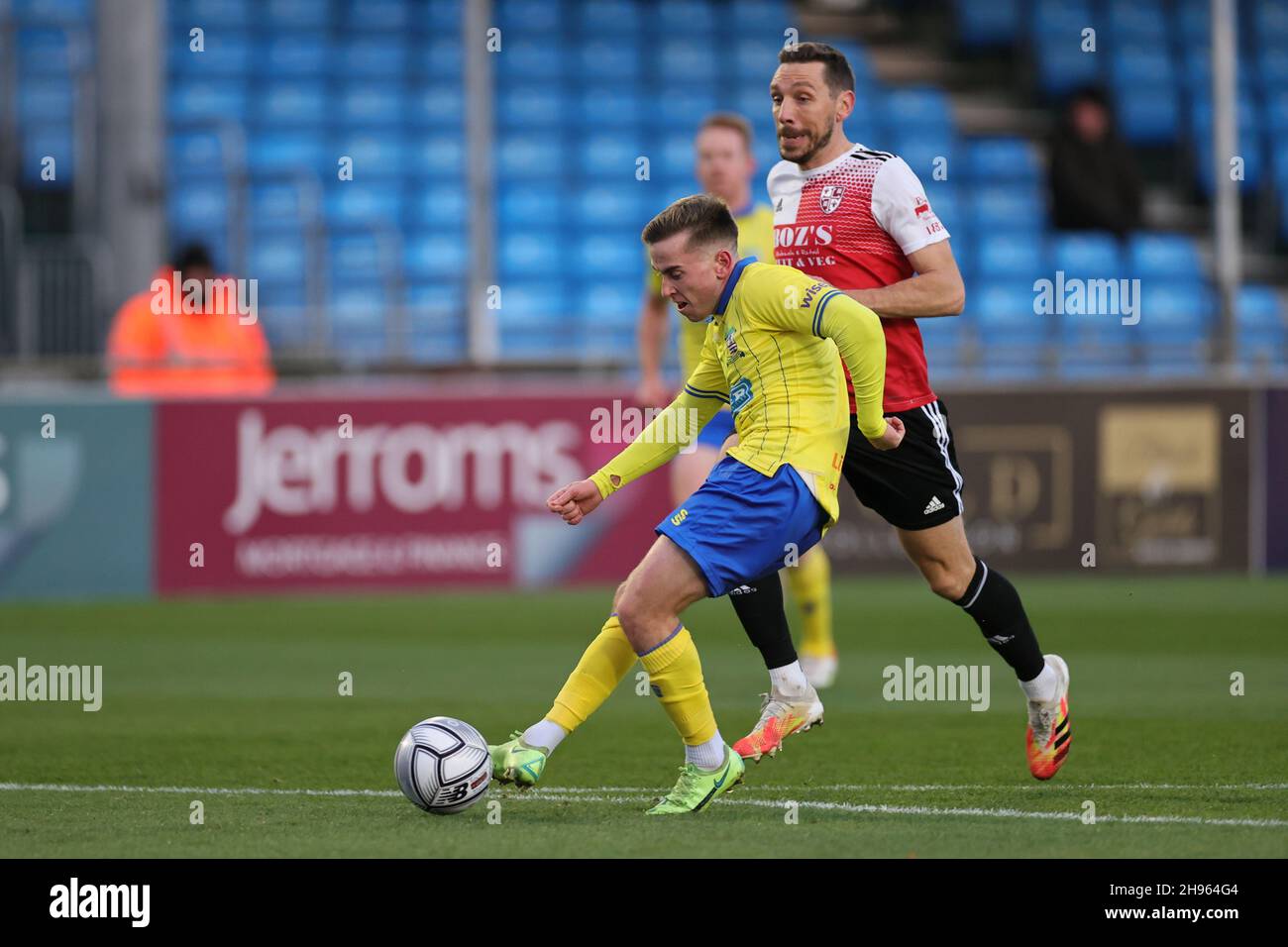 SOLIHULL, ENGLAND. DECEMBER 4TH 2021. Joe Sbarra of Solihull Moors shoots at goal during the Vanarama National League match between Solihull Moors and Woking FC at the Armco Stadium, Solihull on Saturday 4th December 2021. (Credit: James Holyoak/Alamy Live News) Stock Photo