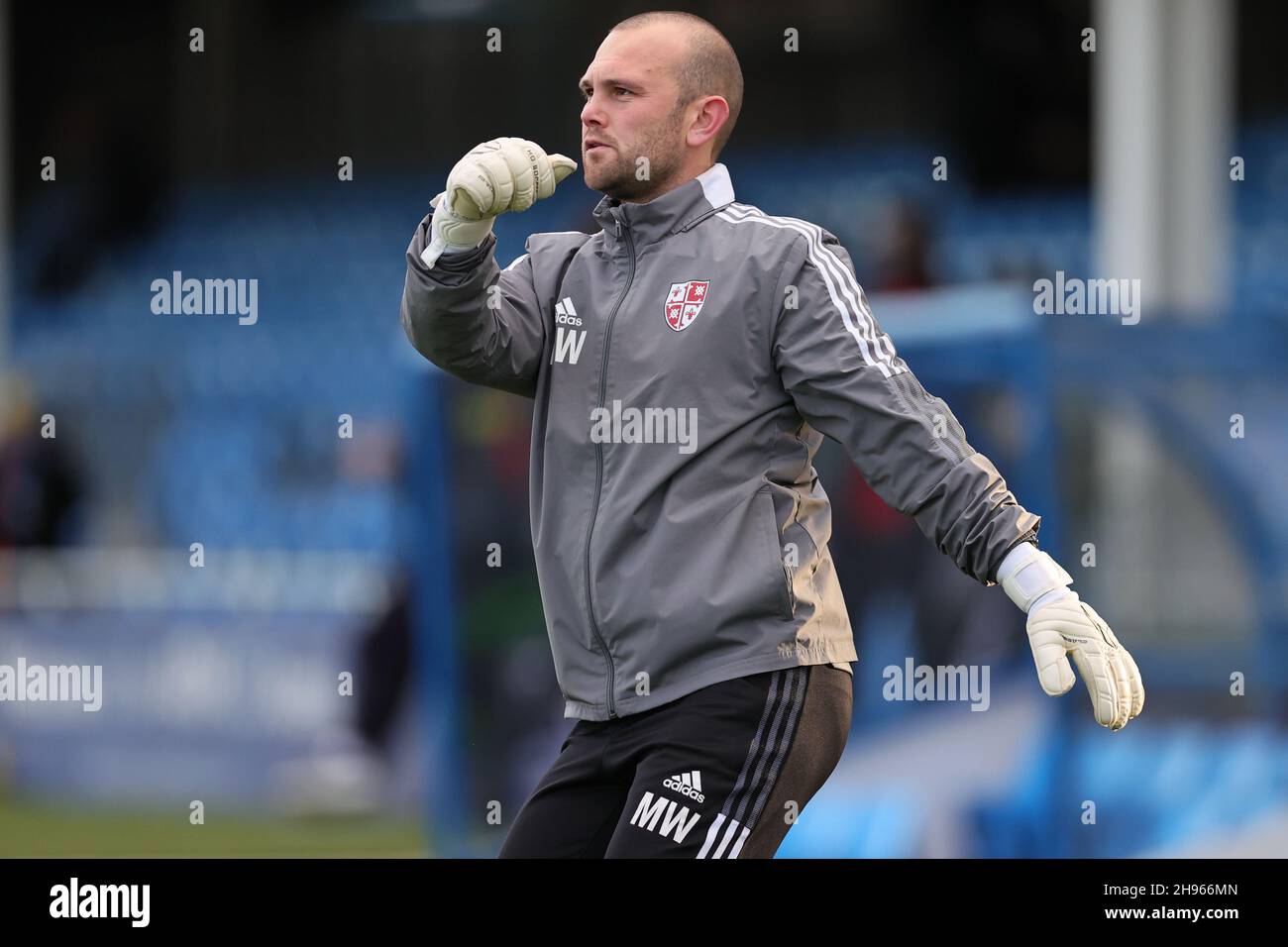 SOLIHULL, ENGLAND. DECEMBER 4TH 2021. Matthew Winter Woking FCÕs goalkeeper coach in the warmup prior to the Vanarama National League match between Solihull Moors and Woking FC at the Armco Stadium, Solihull on Saturday 4th December 2021. (Credit: James Holyoak/Alamy Live News) Stock Photo