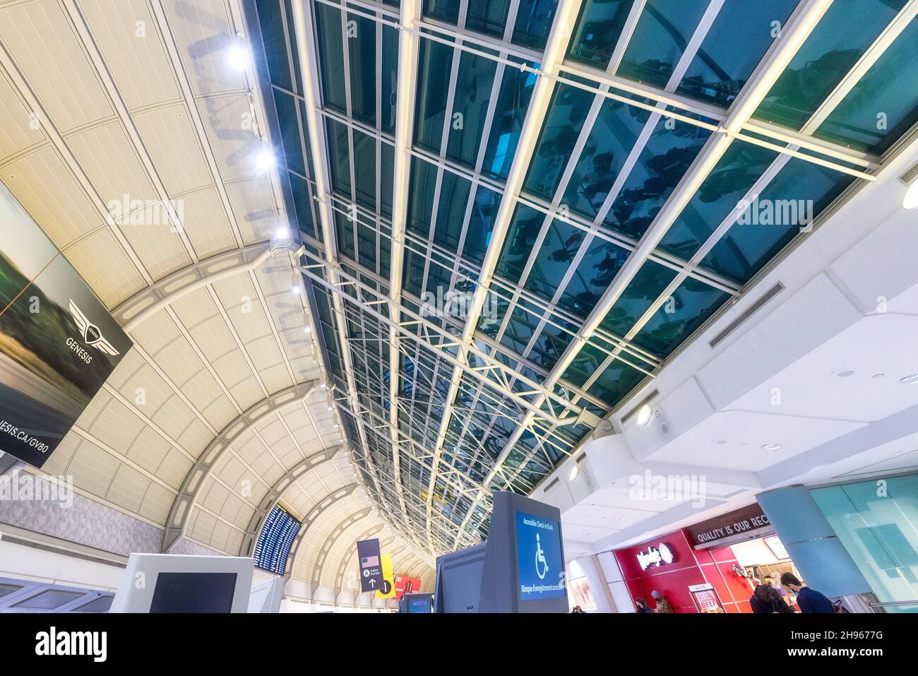 Modern glass ceiling and interior architecture of the Terminal 3 at Pearson International Airport. Dec. 4, 2021 Stock Photo