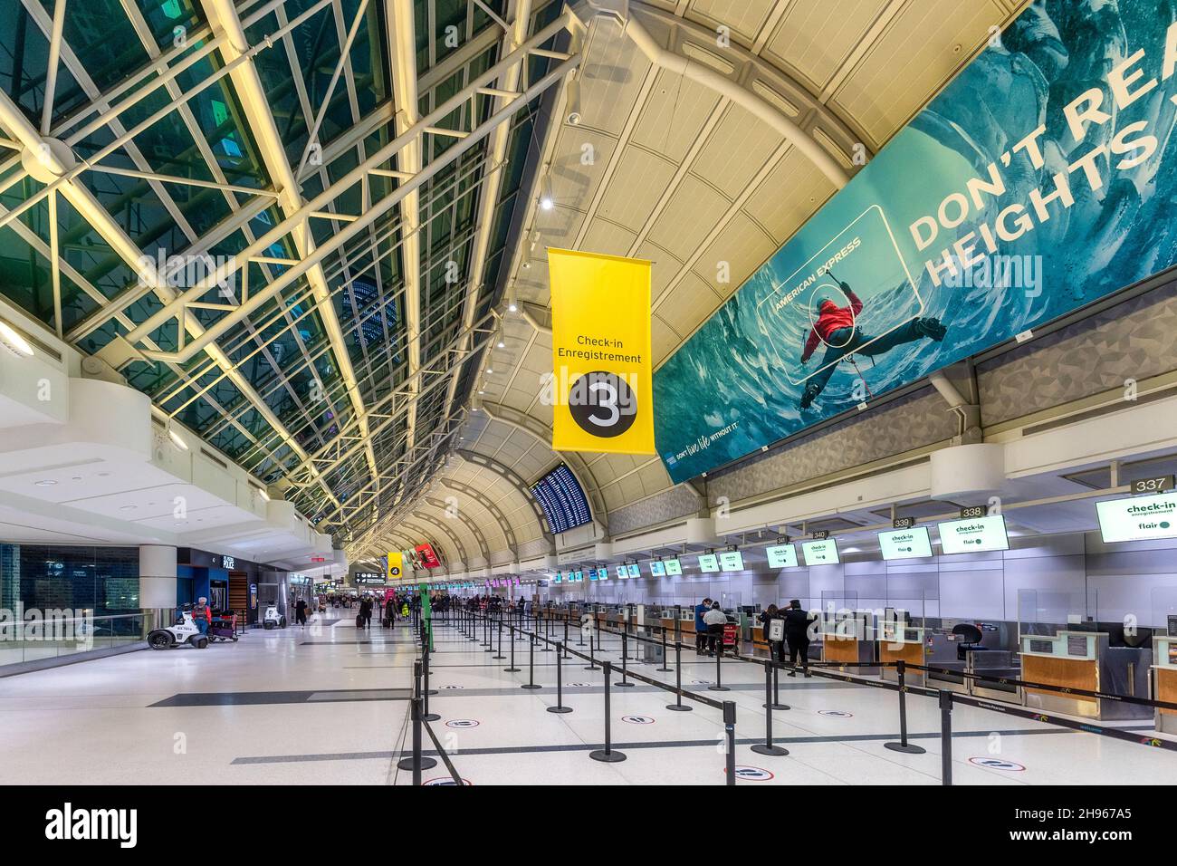 Empty counters and the interior architecture of the Terminal 3 at Pearson International Airport. Dec. 4, 2021 Stock Photo