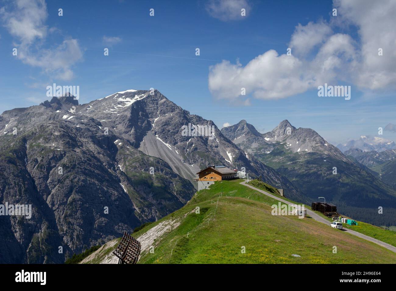 Lech, Austria: Balmalp alpine hut (2100 m), near the summit of Kriegerhorn, Vorarlberg mountains. Backdrop is Unterer Schafberg and Mehlsack. Stock Photo