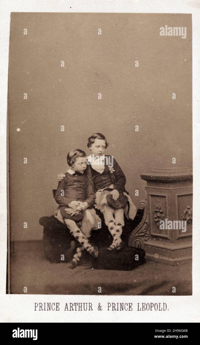 Portrait of Prince Leopold, later Duke of Albany (1853 - 1884) (left), sitting with his brother, Prince Arthur, later Duke of Connaught and Strathearn (1850 - 1942), 1860. Photography by John Jabez Edwin Mayall (1813 - 1901) Stock Photo