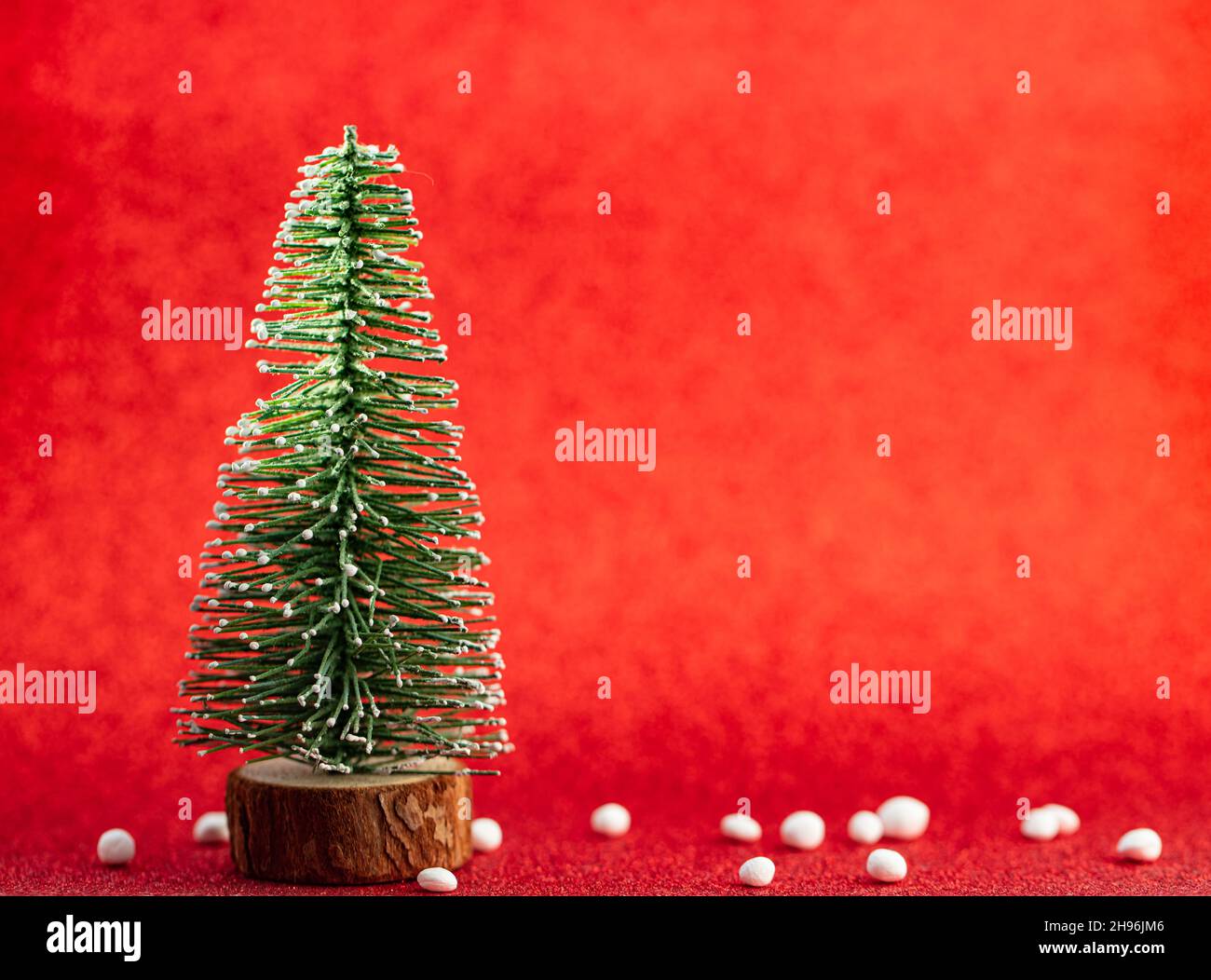toy christnas tree on red glitter background for design purpose Stock ...