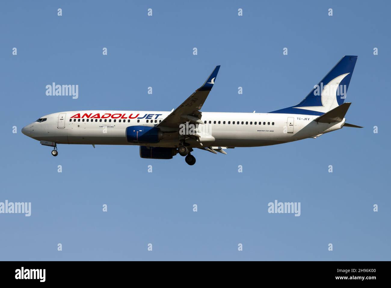 An AnadoluJet Boeing 737-800 landing at Milan Mapensa airport. Stock Photo