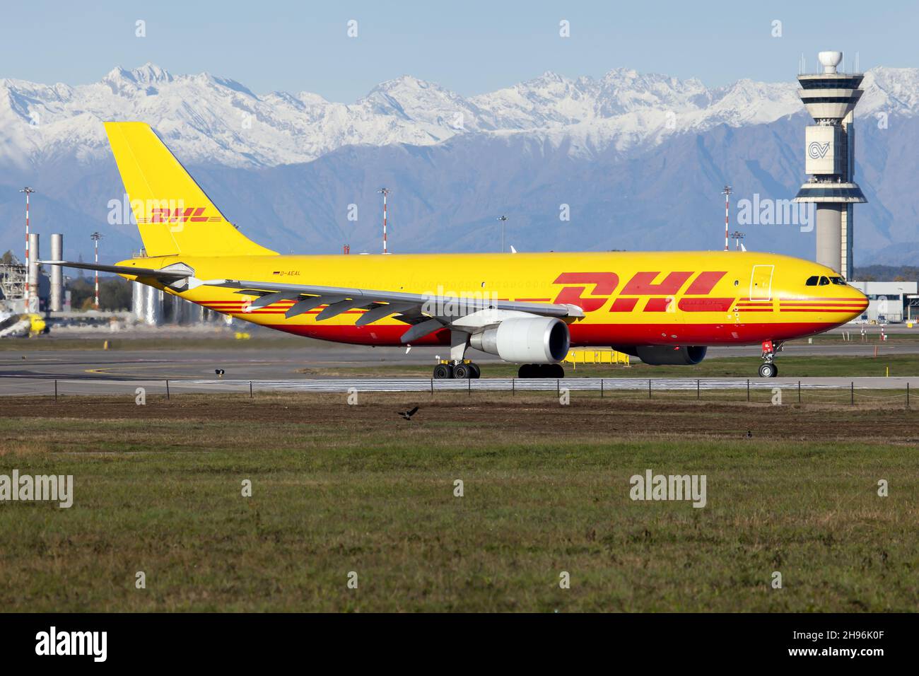 A DHL (European Air Transport) Airbus A300-600F lining up for departure from Milan Malpensa airport. Stock Photo