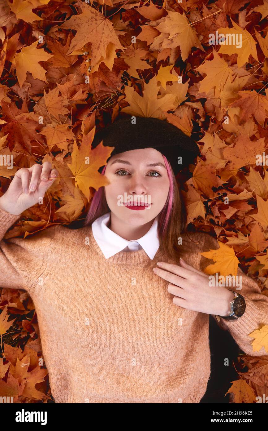 Girl wearing pink sweater hi-res stock photography and images - Alamy