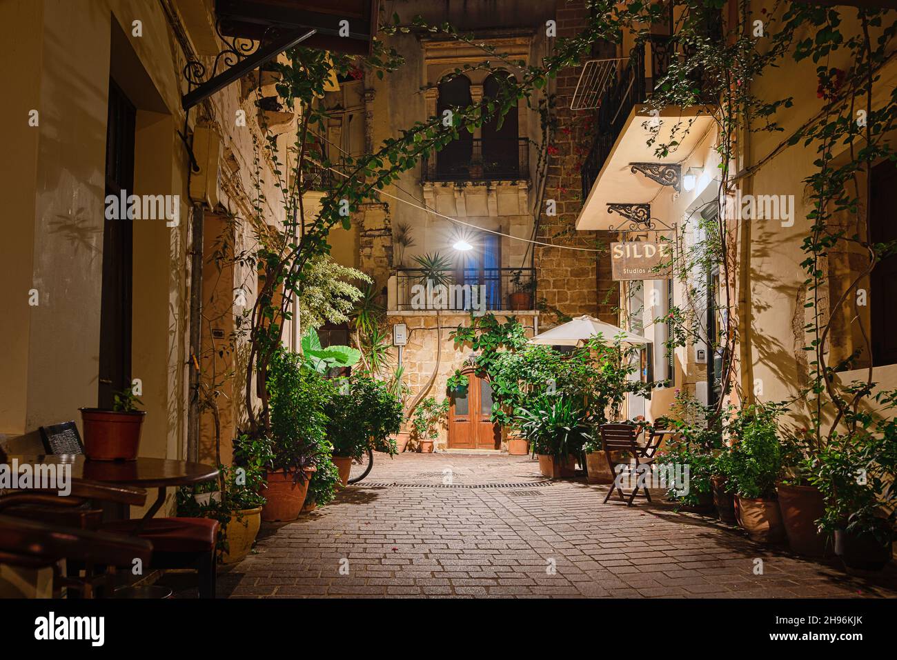 Streetlight illuminating a romantic alley in the old town of Chania, Crete, Greece, October 18, 2021 Stock Photo