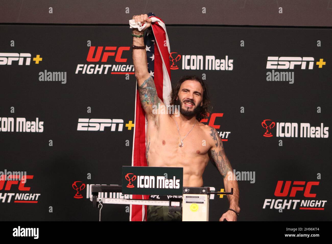 LAS VEGAS, NV - DECEMBER 3: Clay Guida poses on the scale during the UFC Vegas 44: Aldo v Font Weigh-in at UFC Apex on December 3, 2021 in Las Vegas, Nevada, United States. (Photo by Diego Ribas/PxImages) Stock Photo