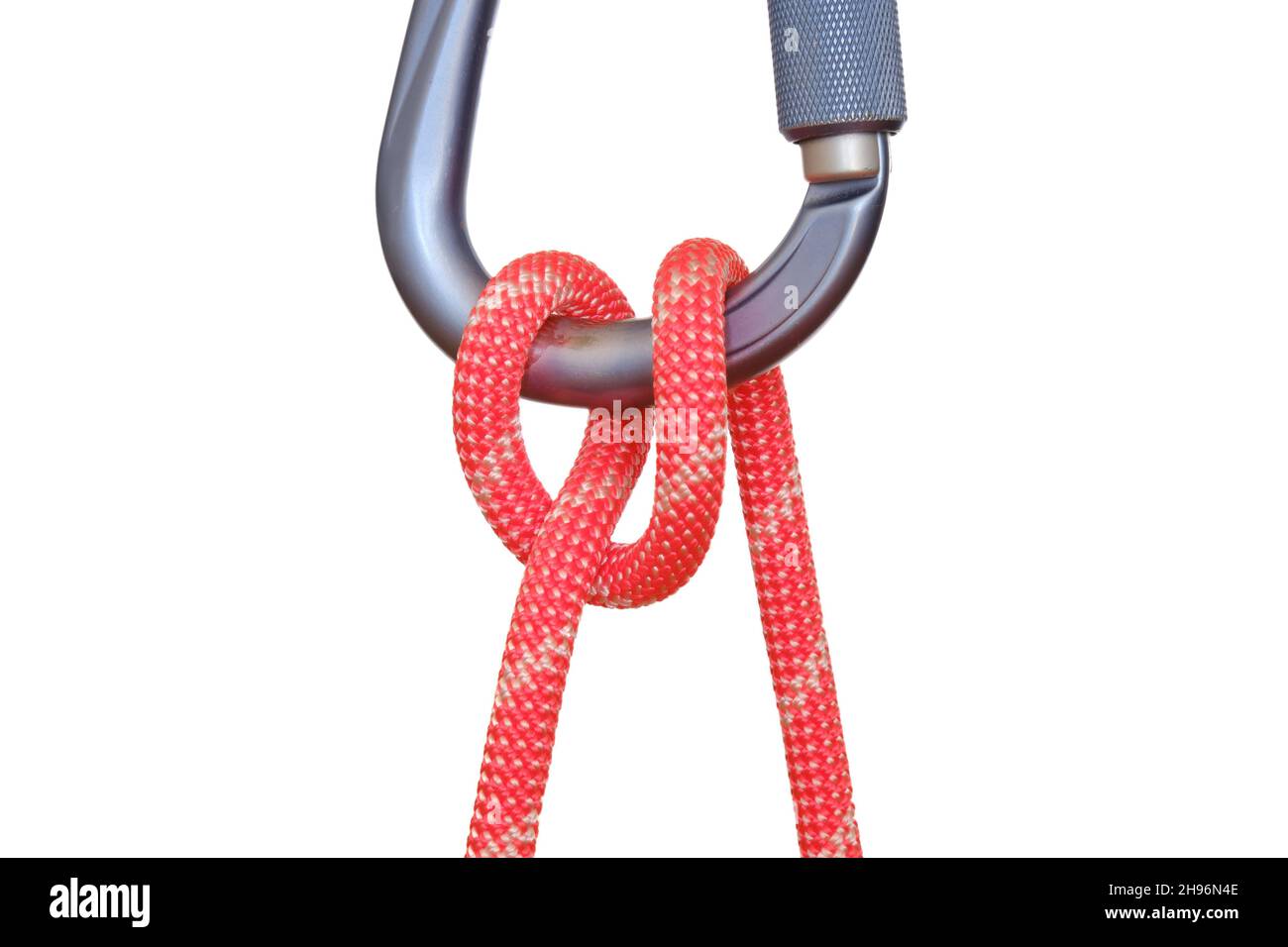 Munter hitch tied with red rope on carabiner, isolated on white