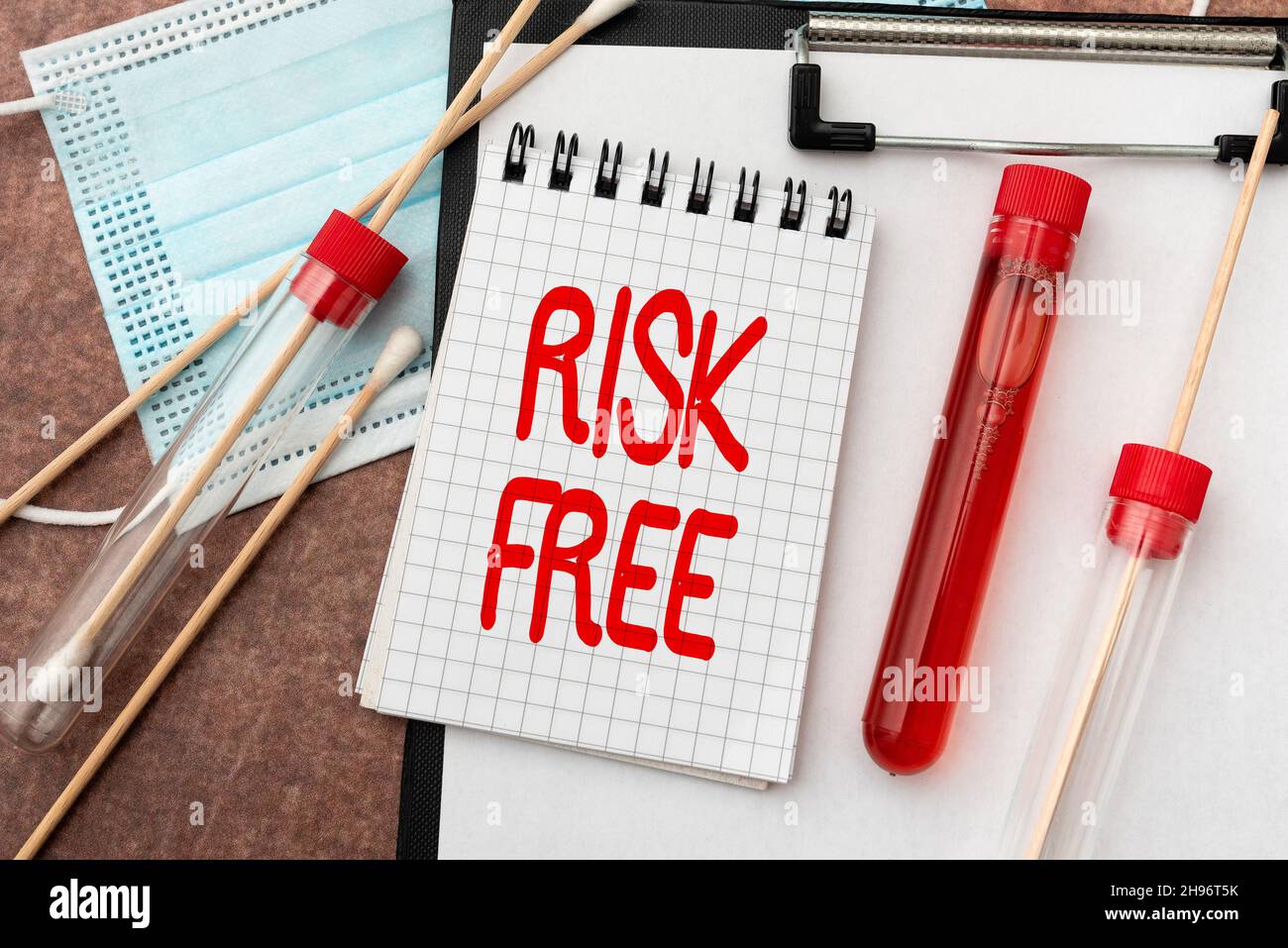 Hand writing sign Risk Free. Concept meaning used to describe something ...