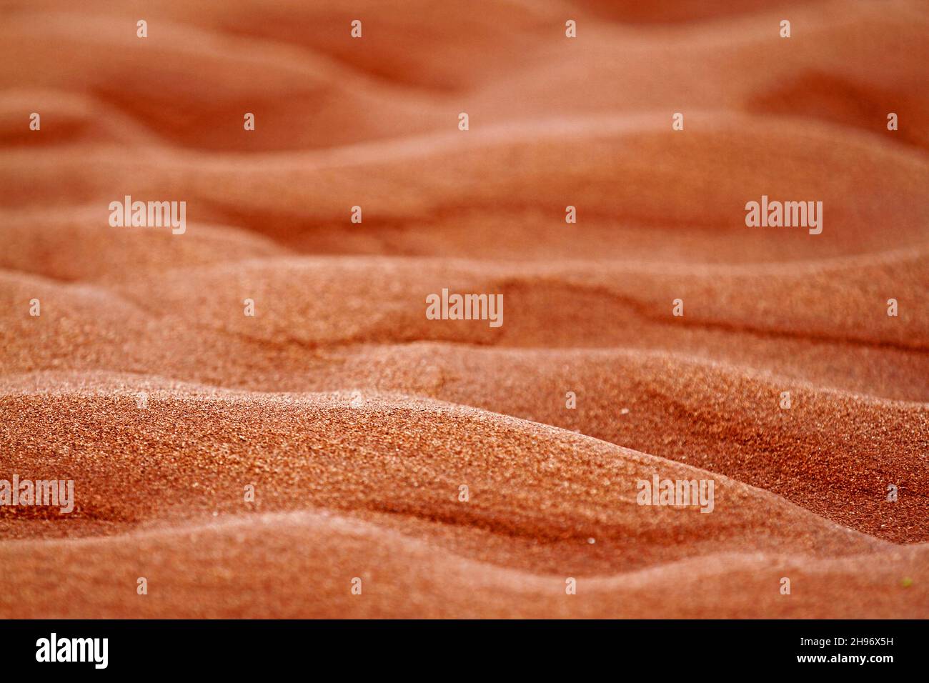 Artistic beach pattern background on red sand on beach in PEI Stock Photo