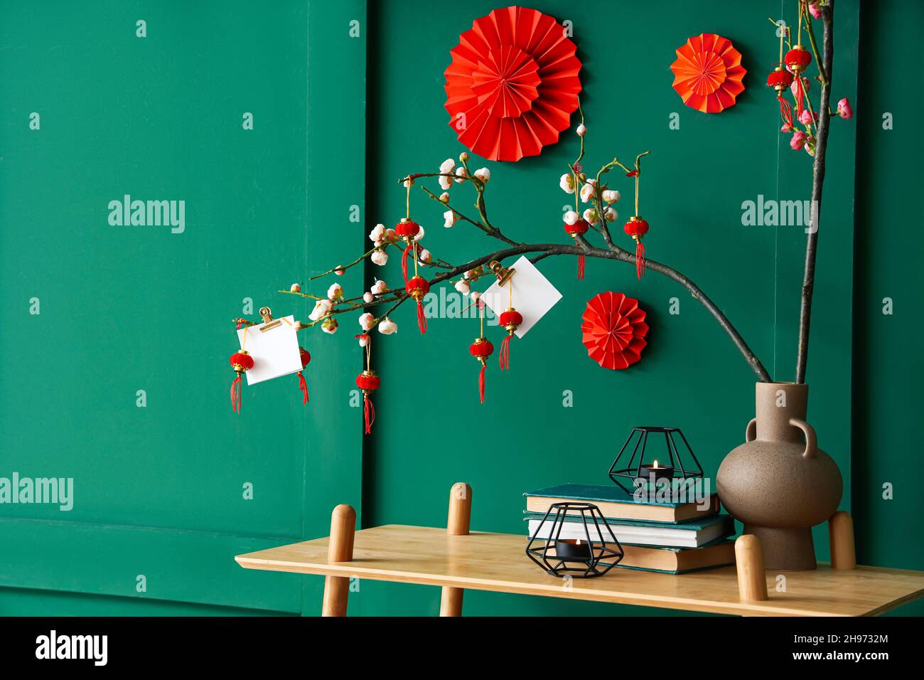 Table with beautiful decorations for Chinese New Year celebration in