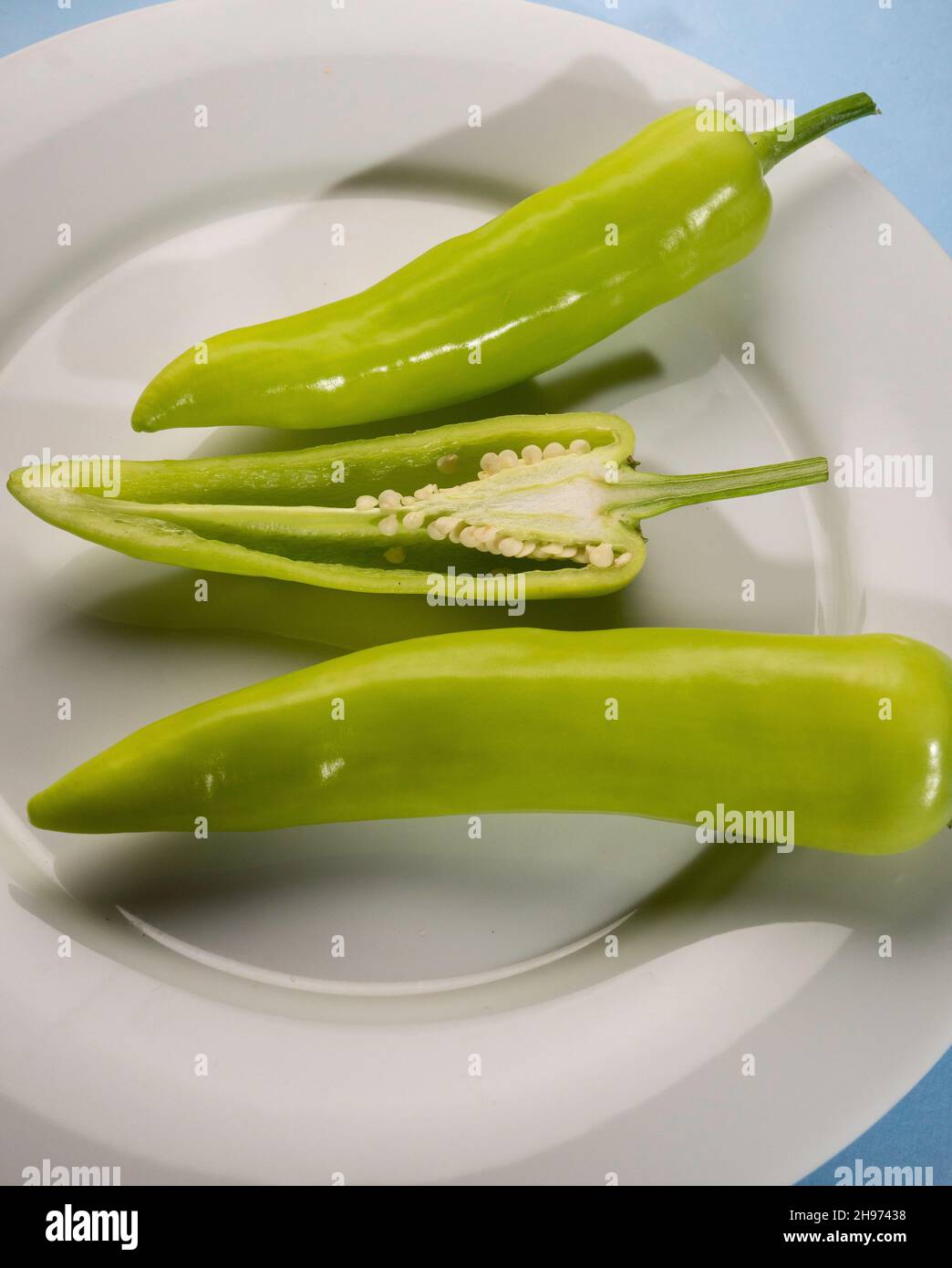 Close up of frsh green chilli peppers on tabel Stock Photo