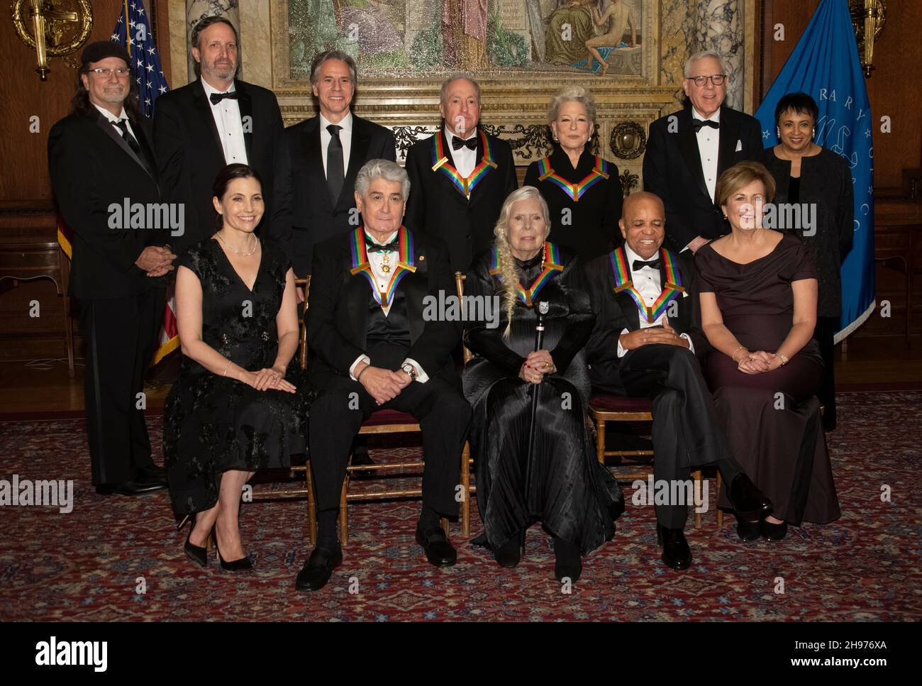 The recipients of the 44th Annual Kennedy Center Honors pose for a group photo following the Medallion Ceremony at the Library of Congress in Washington, DC on Saturday, December 4, 2021. From left to right back row: producer Glenn Weiss, producer Ricky Kirshner, United States Secretary of State Antony Blinken, ‘Saturday Night Live' creator Lorne Michaels, legendary stage and screen icon Bette Midler, David M. Rubenstein, chairman of the Kennedy Center for the Performing Arts, and Carla Hayden, the 14th Librarian of Congress. Front row, left to right: Evan Ryan, wife of Secretary Blinken, Stock Photo