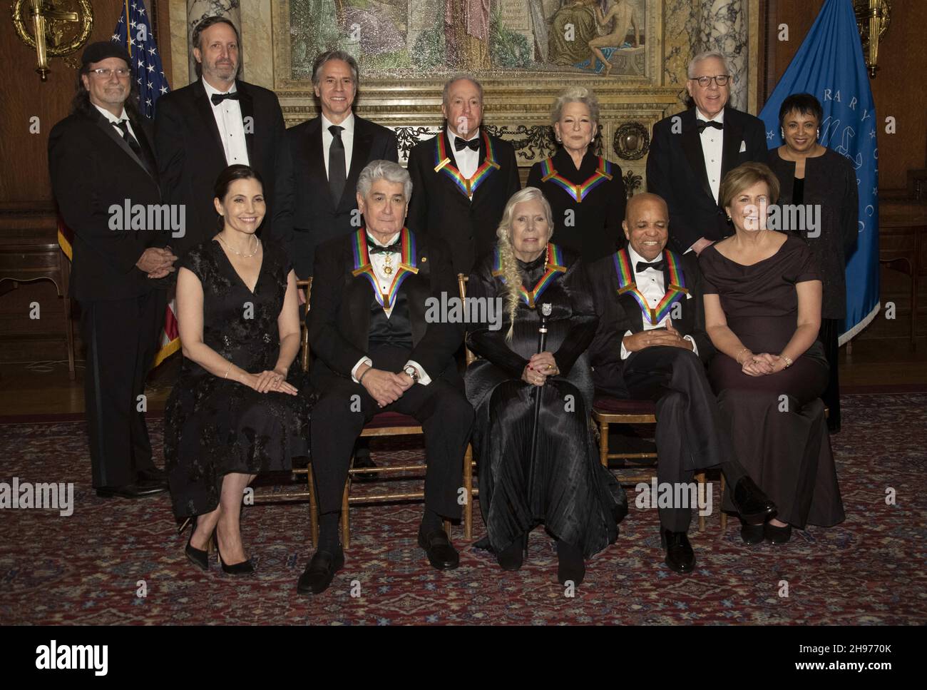 The recipients of the 44th Annual Kennedy Center Honors pose for a group photo following the Medallion Ceremony at the Library of Congress in Washington, D.C. on Saturday, December 4, 2021. From left to right back row: producer Glenn Weiss, producer Ricky Kirshner, United States Secretary of State Antony Blinken, âSaturday Night Liveâ creator Lorne Michaels, legendary stage and screen icon Bette Midler, David M. Rubenstein, chairman of the Kennedy Center for the Performing Arts, and Carla Hayden, the 14th Librarian of Congress. Front row, left to right: Evan Ryan, wife of Secretary Blinken Stock Photo