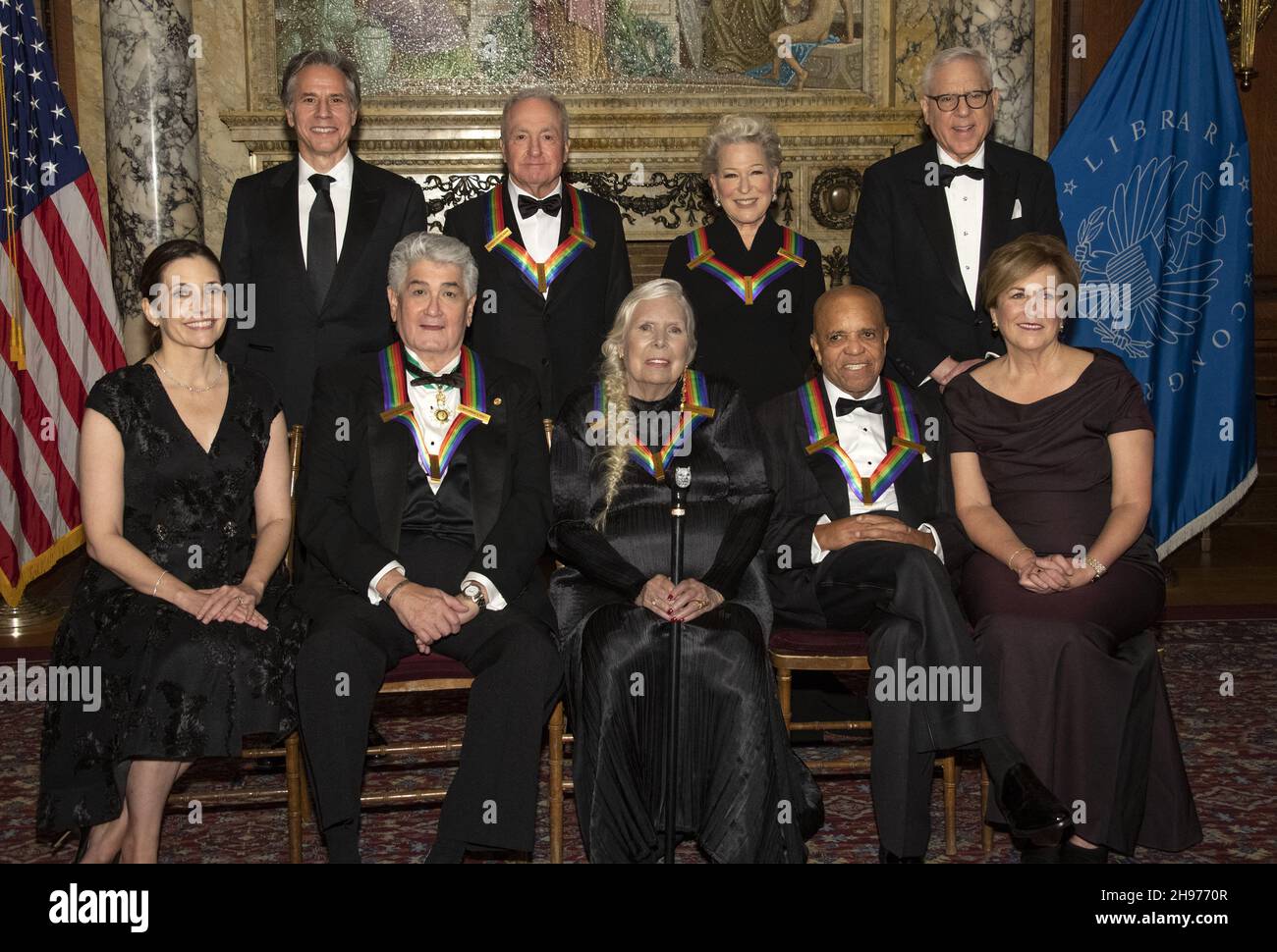 The recipients of the 44th Annual Kennedy Center Honors pose for a group photo following the Medallion Ceremony at the Library of Congress in Washington, D.C. on Saturday, December 4, 2021. From left to right back row: United States Secretary of State Antony Blinken, âSaturday Night Liveâ creator Lorne Michaels, legendary stage and screen icon Bette Midler, and David M. Rubenstein, chairman of the Kennedy Center for the Performing Arts. Front row, left to right: Evan Ryan, wife of Secretary Blinken, operatic bass-baritone Justino Diaz, singer-songwriter Joni Mitchell, Motown founder, songw Stock Photo