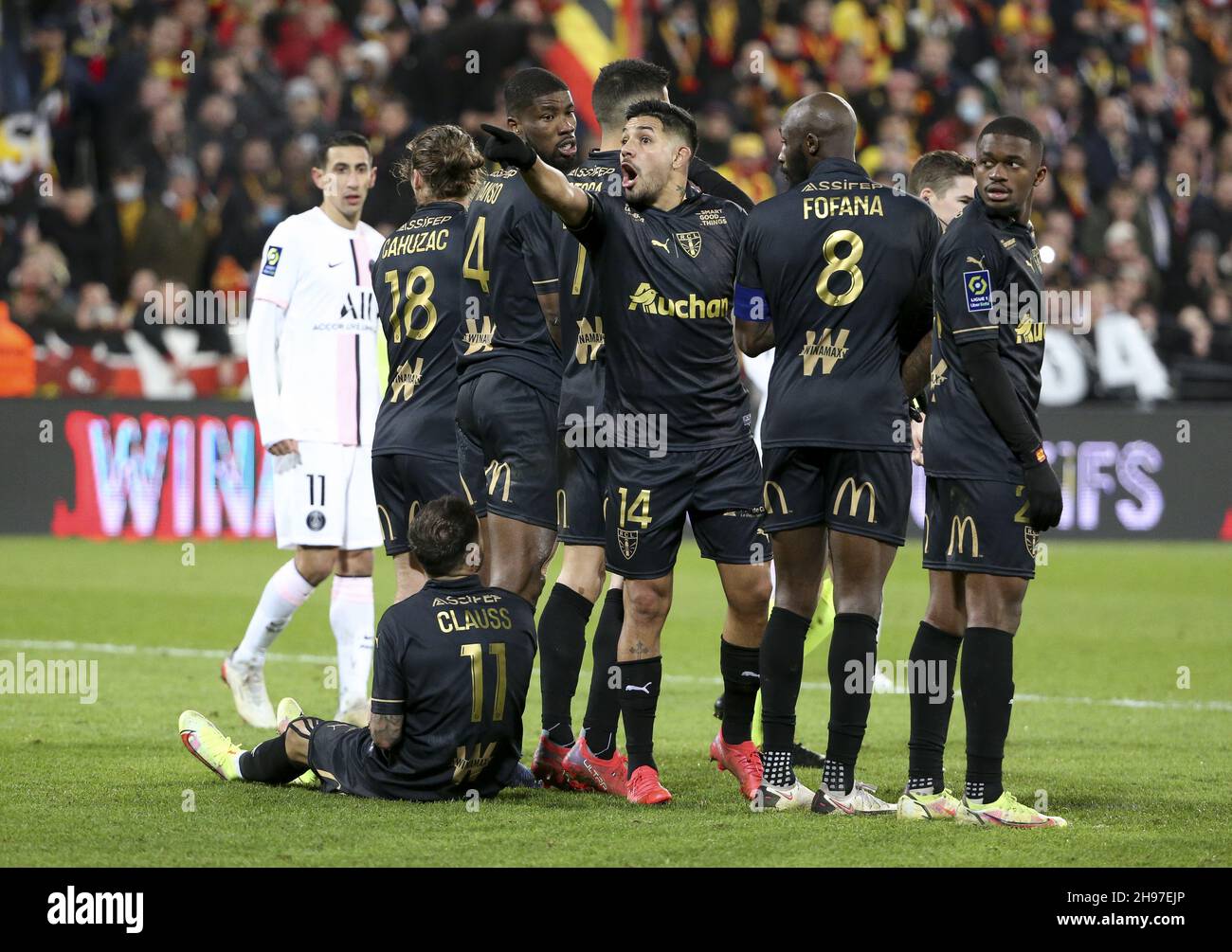 Facundo Medina of Lens yells during the French championship Ligue 1 football match between RC Lens and Paris Saint-Germain on December 4, 2021 at Bollaert-Delelis stadium in Lens, France - Photo: Jean Catuffe/DPPI/LiveMedia Stock Photo