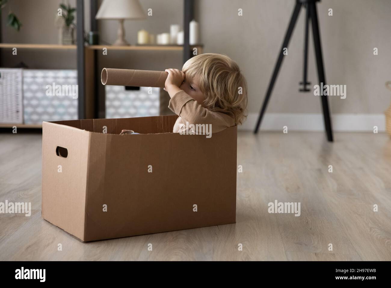 Dreamy little preschool boy playing sailor at home Stock Photo