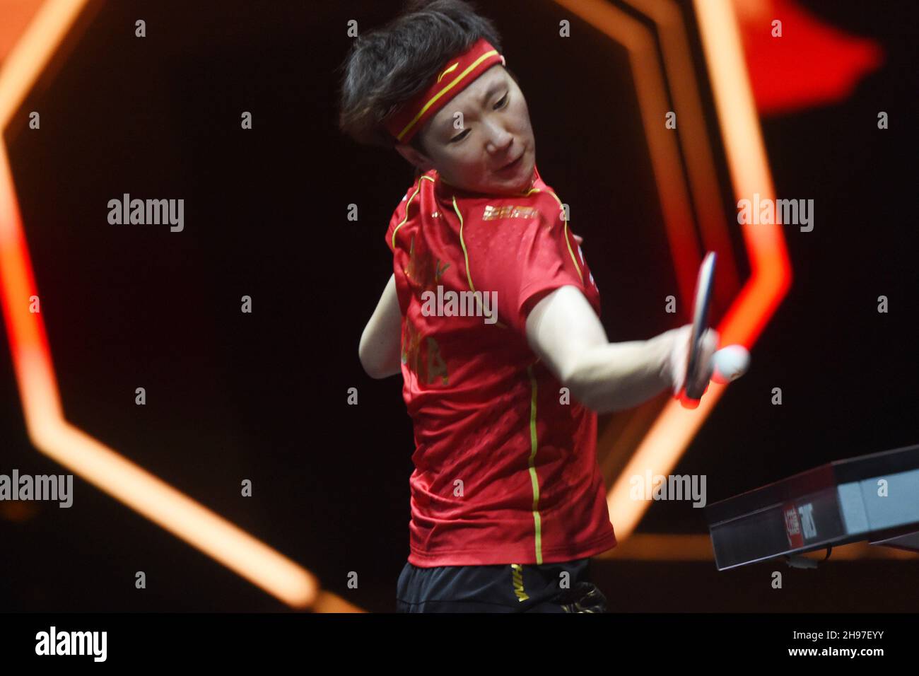 Singapore. 4th Dec, 2021. Wang Manyu of China hits a return during the