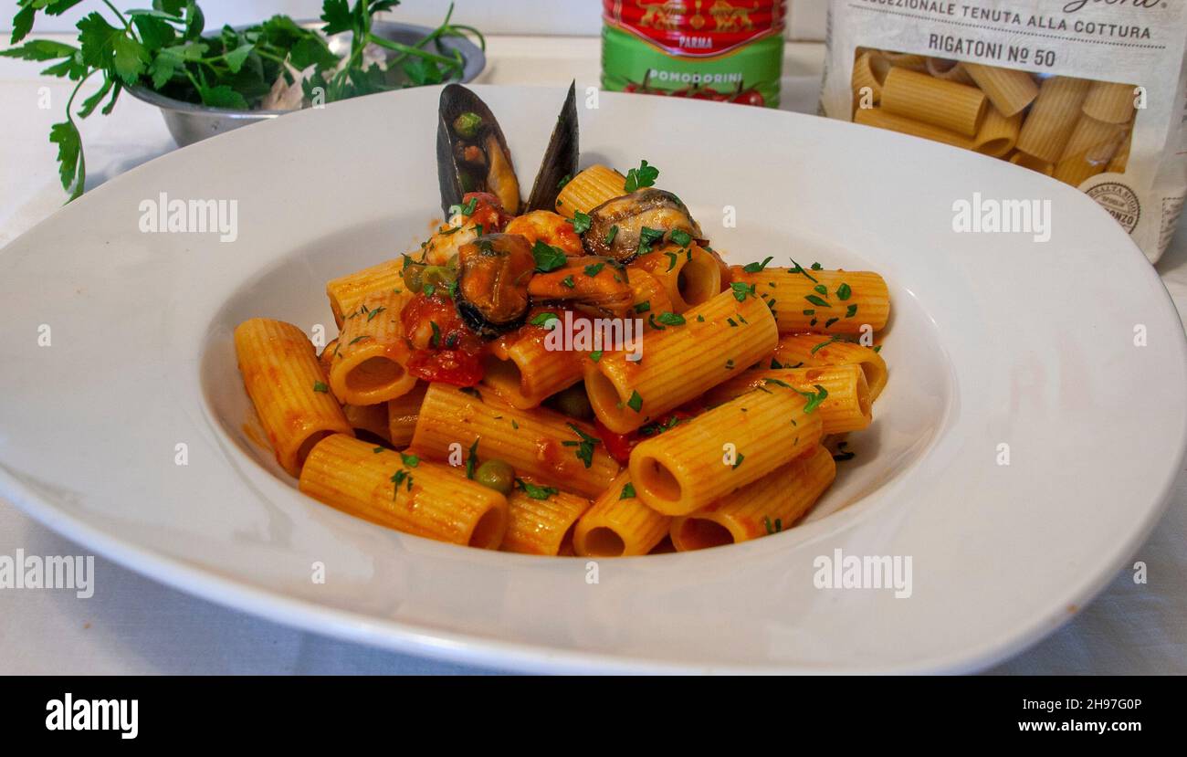 Pasta with mussels and peas is a seafood first course that balances two opposing flavors the