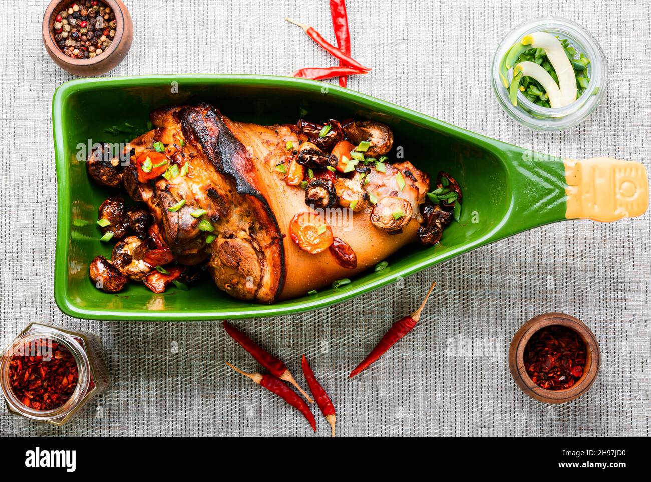 Delicious roast pork knuckle in the baking dish. Pork hock Stock Photo
