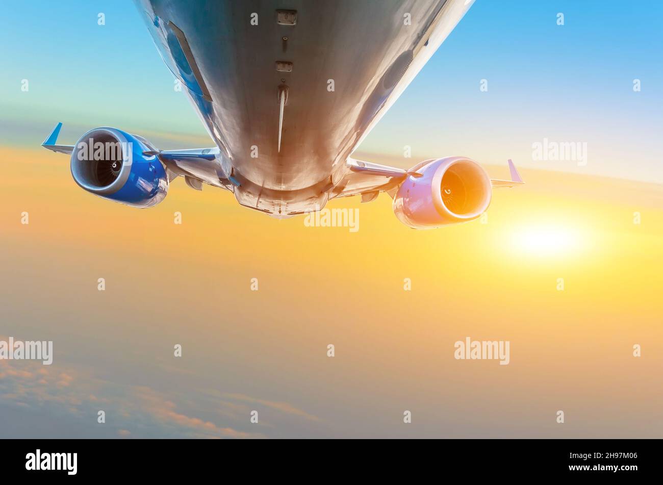 Passenger plane flies in the sky against the background of cirrus ...