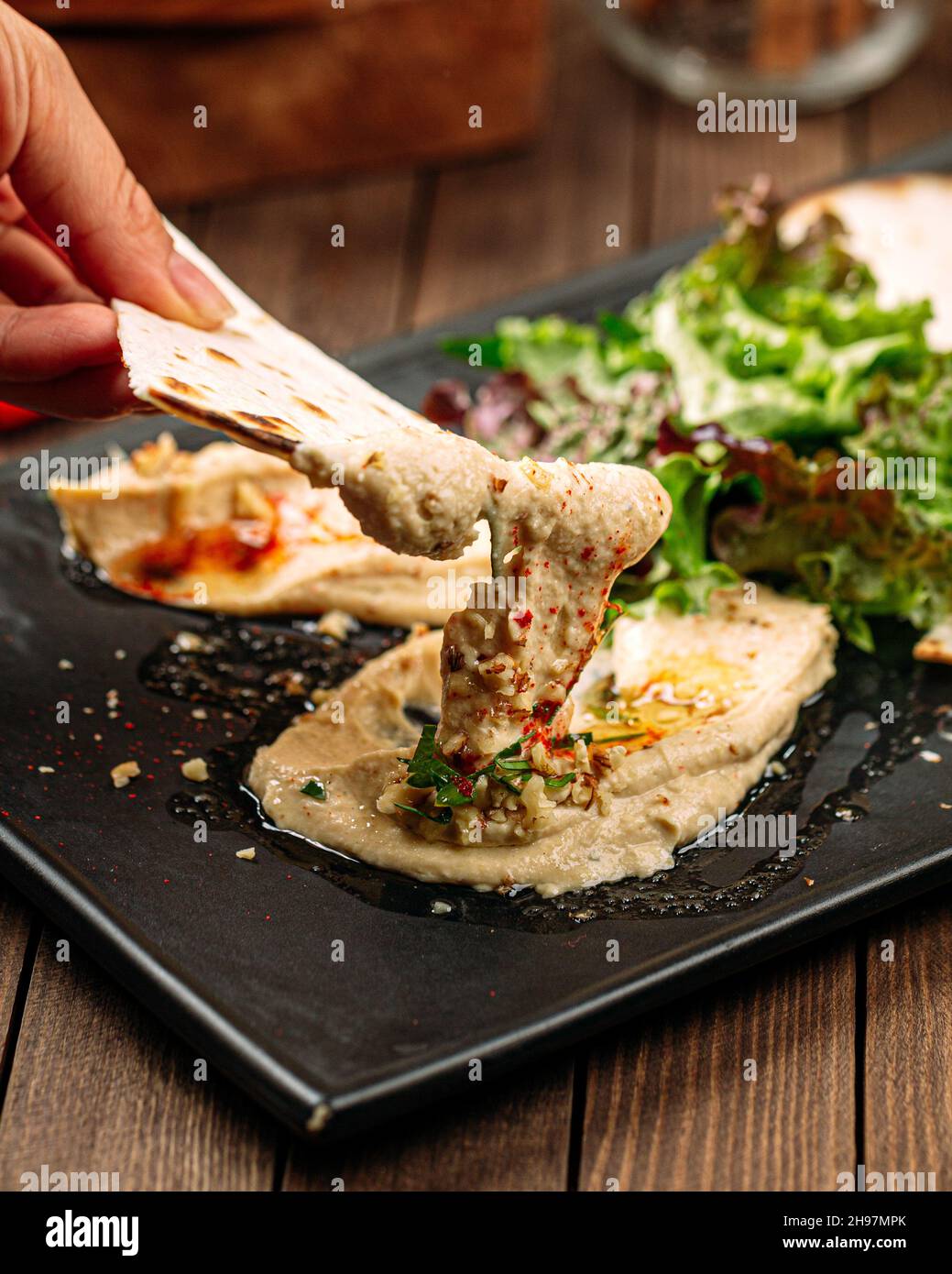 Classic hummus spread sauce with pita bread Stock Photo Alamy