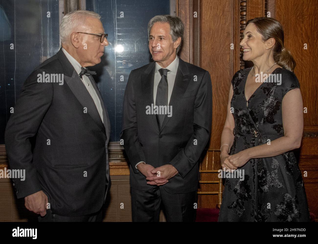 Washington, United States. 05th Dec, 2021. David M. Rubenstein, chairman of the Kennedy Center for the Performing Arts, left, speaks with United States Secretary of State Antony Blinken, center and Blinken's wife, Evan Ryan following the Medallion Ceremony at the Library of Congress in Washington, DC on Saturday, December 4, 2021. Photo by Ron Sachs/UPI Credit: UPI/Alamy Live News Stock Photo