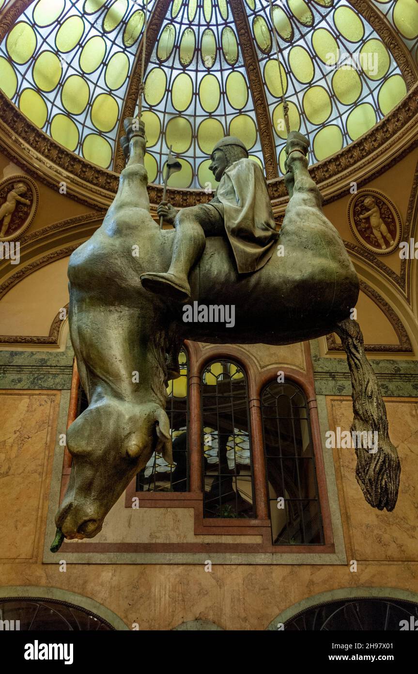 David Černý's 1999 statue "Kun" (Horse), has King Wenceslas Riding an Upside-Down Dead Horse, in the Lucerna Palace in Wenceslas Square Stock Photo