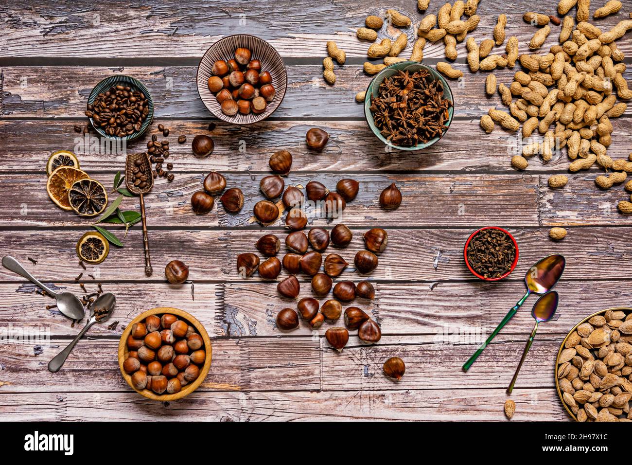 Still life with dried fruits, chestnuts and hazelnuts with coffee beans