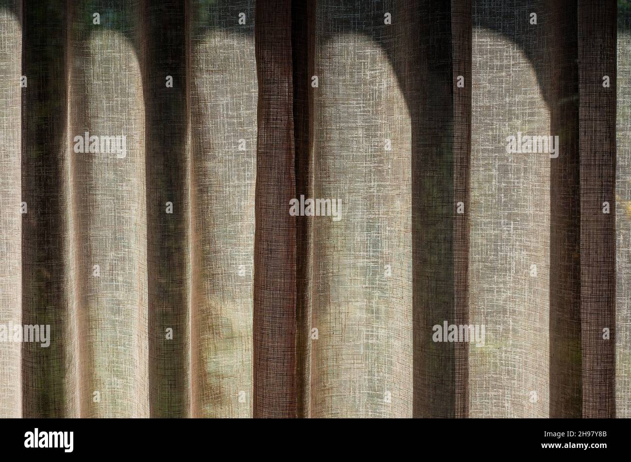 sunlight through net curtains Stock Photo