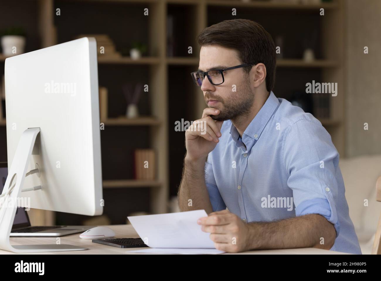 Young man with big glasses hi-res stock photography and images - Alamy
