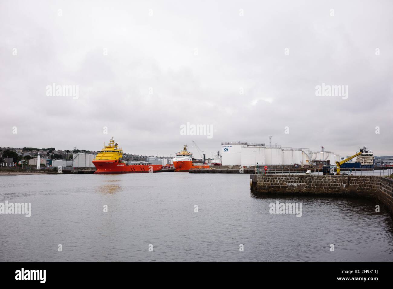 Offshore oil & gas industry supply vessels docked in the harbour of Aberdeen. Stock Photo