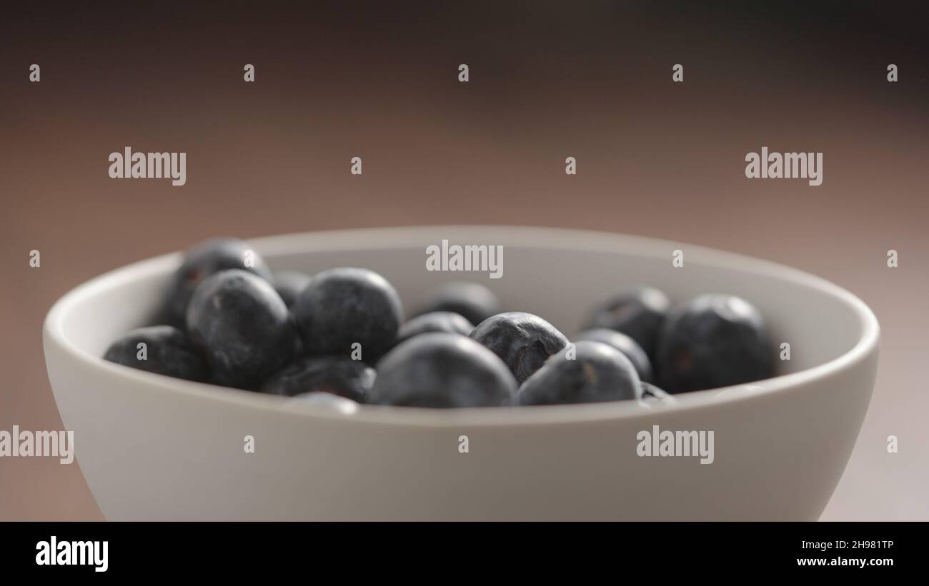 fresh blueberries in white bowl, wide photo Stock Photo