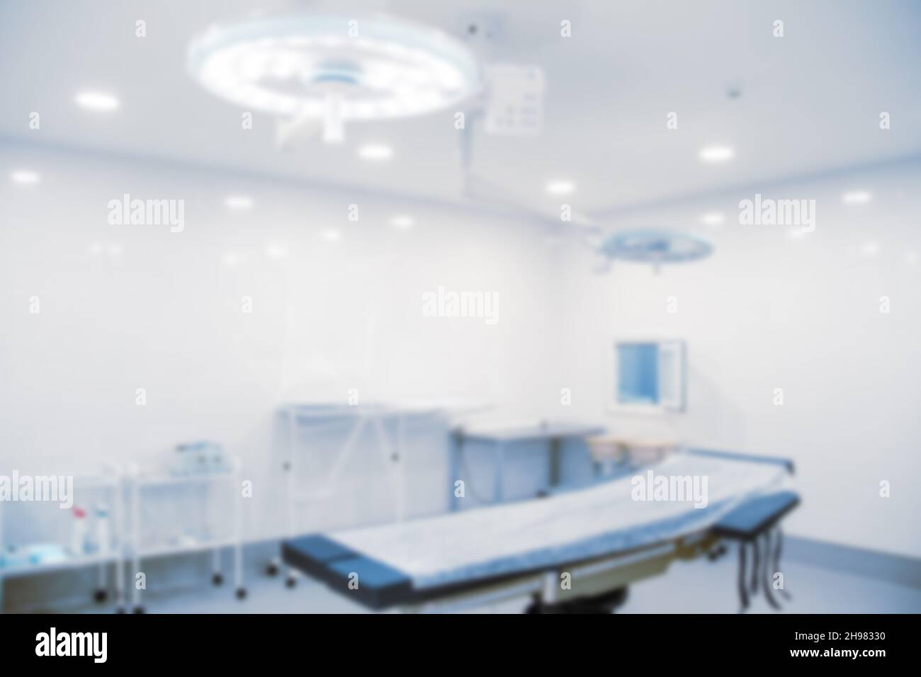 Abstract blur of hospital and clinic interior. Modern equipment in operating room. Medical devices for neurosurgery. Surgery instruments and surgical Stock Photo