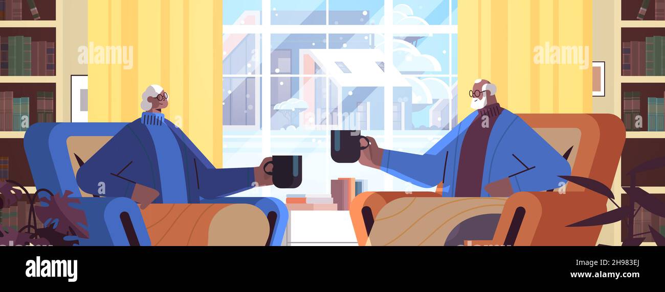 senior african american couple drinking coffee and talking together at ...