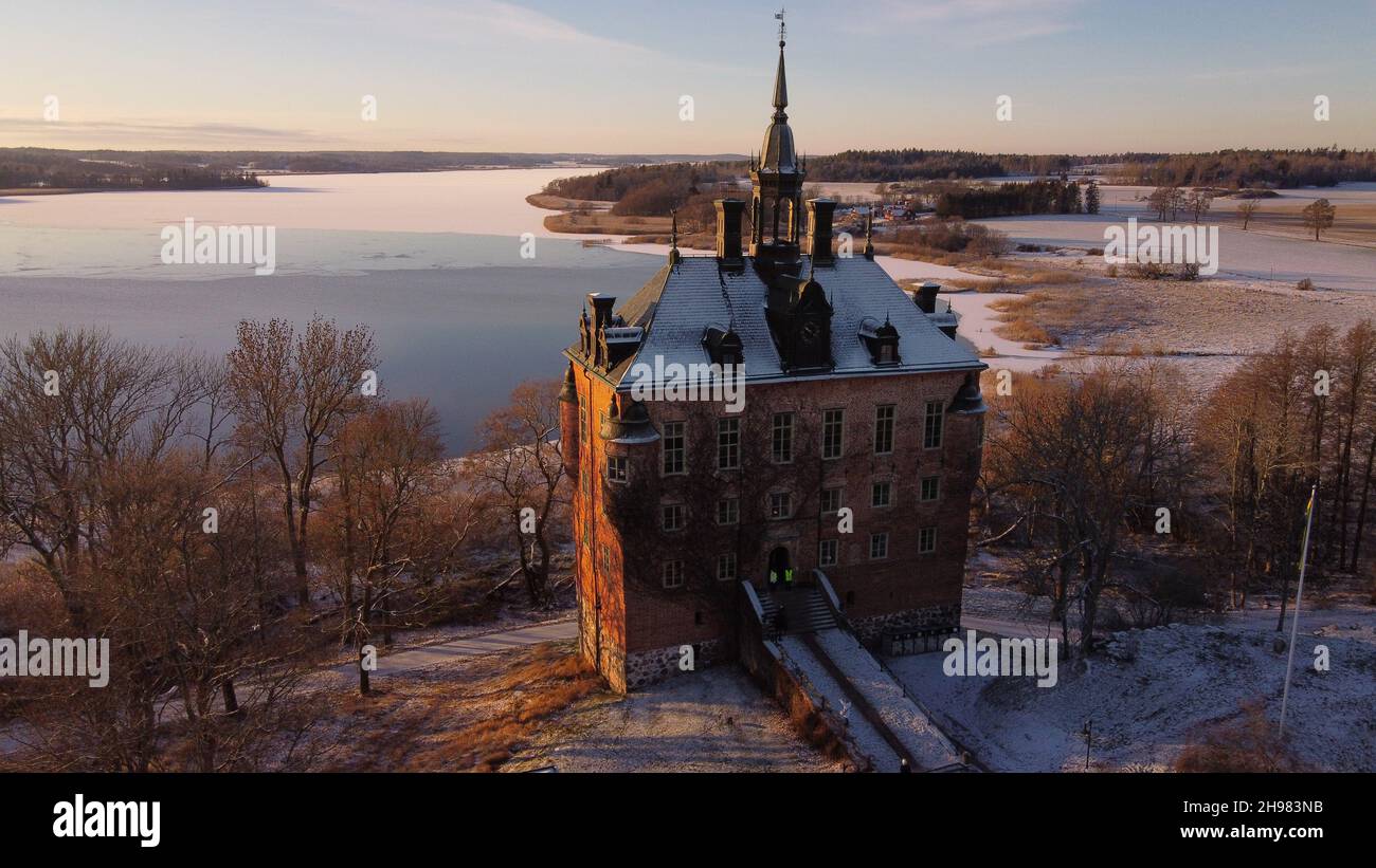 A drone shot of Wiks Castle near Uppsala during the Christmas market, December 2021, Sweden Stock Photo